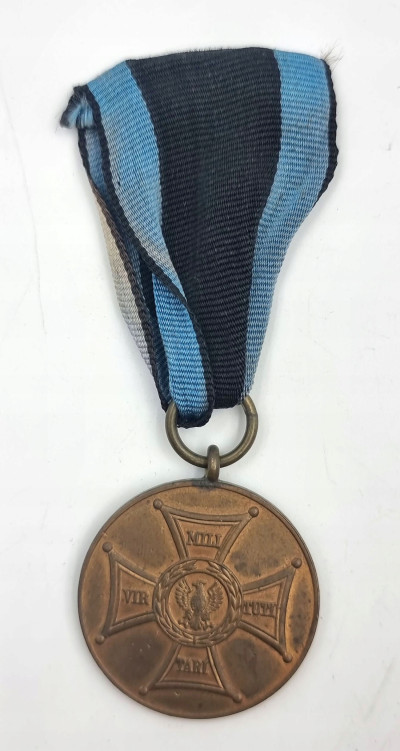 Brązowy medal Zasłużony na Polu Chwały – Caritas