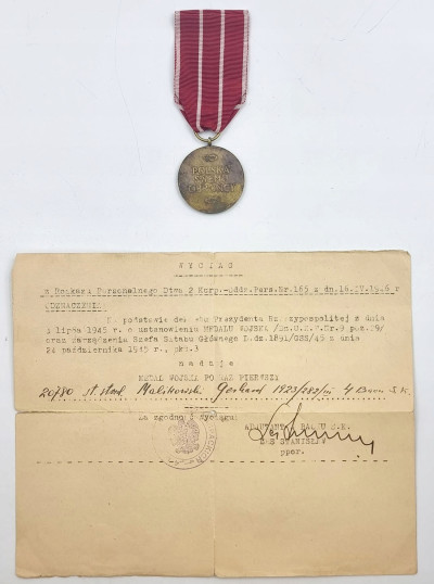 Medal Wojska Spink z wypisem nadania