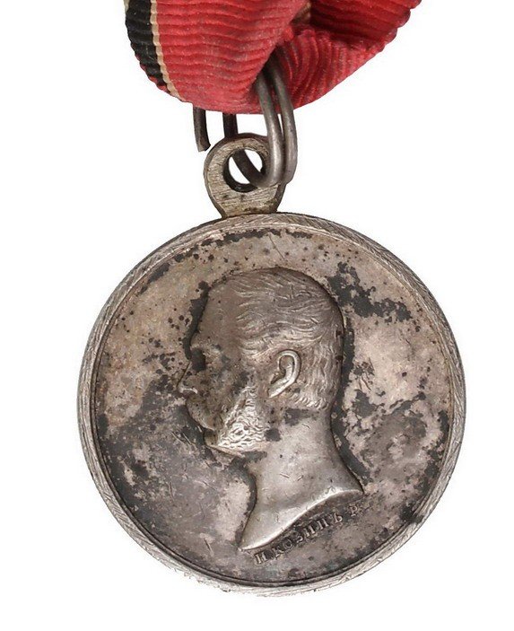 Znak Honorowego Orderu Wojennego oraz medal: „Za podbój Czeczenii i Dagestanu”