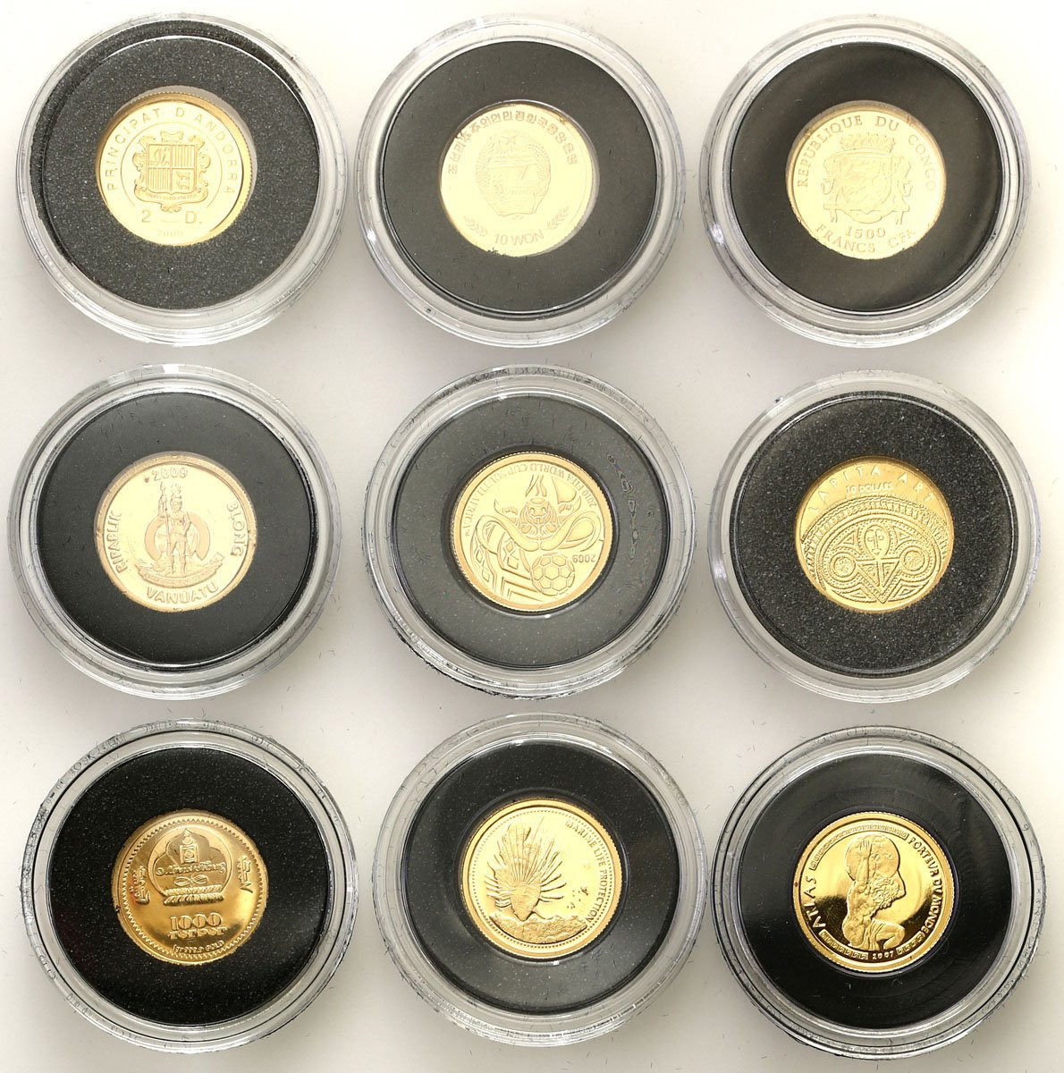 Najmniejsze monety świata zestaw 9 szt. ZŁOTO