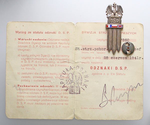 Odznaka D.S.P. z dokumentem nadania.